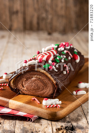Chocolate yule log christmas cake Chocolate yule log christmas cake 71883220