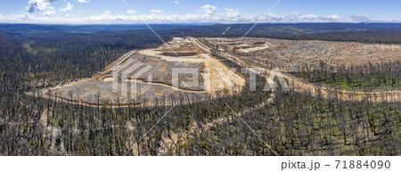 Aerial view of forest regeneration and a quarry in regional Australia Aerial view of forest regeneration and a quarry in regional Australia 71884090