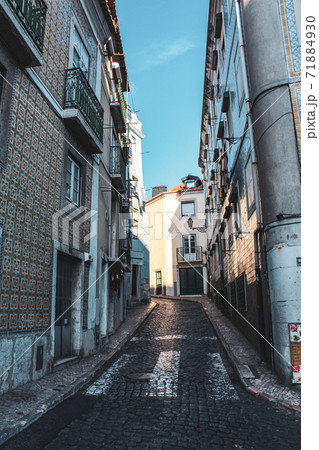 Lisbon in Portugal, Street perspective view with colorful traditional houses Lisbon in Portugal, Street perspective view with colorful traditional houses 71884930