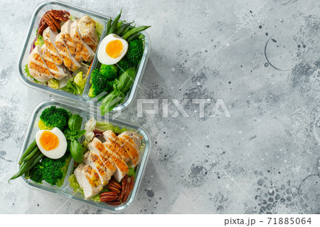 Healthy meal prep containers with chicken breast. Healthy meal prep containers with chicken breast. 71885064