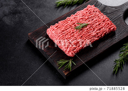 Fresh raw beef mince on a dark background 71885528
