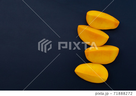 Tropical fruit, Mango on dark background. 71888272