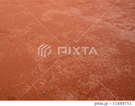 Red clay texture of tennis court. Surface of red sports field 71889751