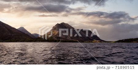 Glacier Lake surrounded by the beautiful Canadian Rocky Mountains 71890515