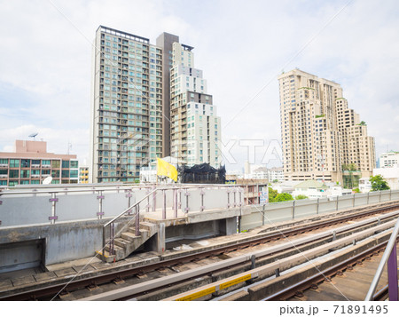 Modern city building with railway of train in  71891495