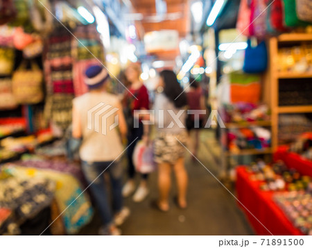 Blurred group of tourist people shopping in Blurred group of tourist people shopping in 71891500