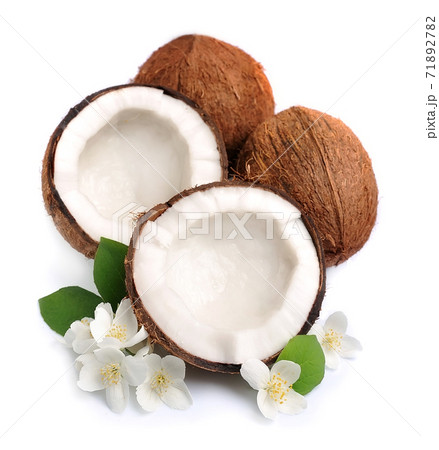 Coconuts with flowers isolated on white backgrounds. Coconuts with flowers isolated on white backgrounds. 71892782
