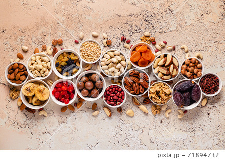 Nuts and dried fruits assortment. Nuts and dried fruits assortment. 71894732