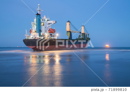 Refloating large ship, long exposure with text space Refloating large ship, long exposure with text space 71899810
