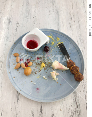 leftovers of a breakfast on a wooden table leftovers of a breakfast on a wooden table 71901186