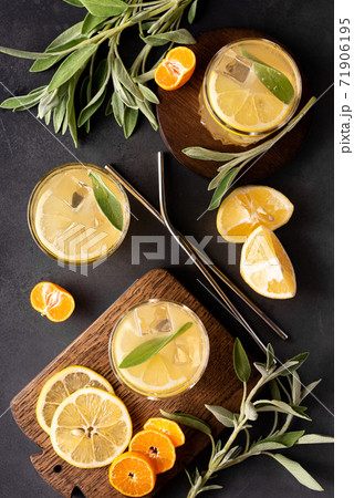 homemade lemonade with lemon slices and ice in glasses homemade lemonade with lemon slices and ice in glasses 71906195