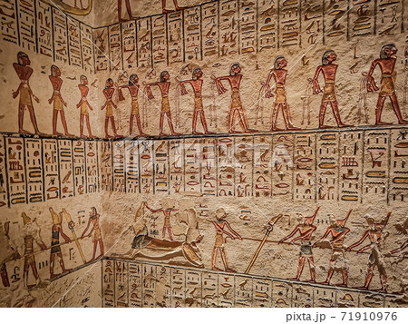 Ancient Egyptian writing, Egyptian hieroglyphs, wall inscriptions 71910976