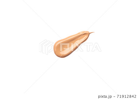 Bright beige smear of foundation diagonal strokes isolated on a white background. 71912842