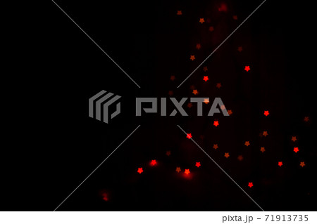 Figured boke in the form of a star on a dark background. Figured boke in the form of a star on a dark background. 71913735