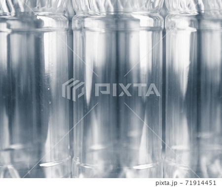 empty plastic bottles on green background empty plastic bottles on green background 71914451