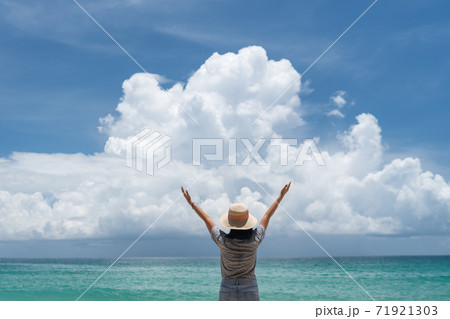 Woman travel around the world with summer beach freedom and relax life. 71921303