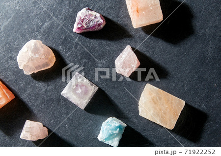 quartz crystal pyramid and gem stones on slate quartz crystal pyramid and gem stones on slate 71922252