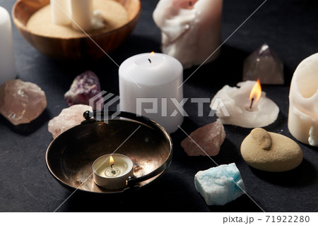 burning candles and crystals for magic ritual 71922280