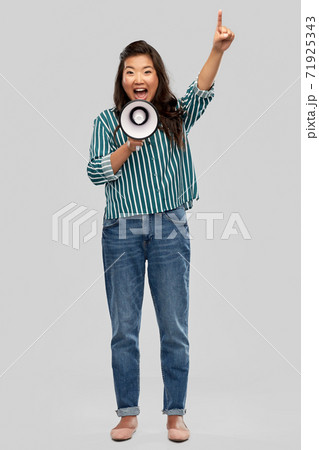 asian woman speaking to megaphone asian woman speaking to megaphone 71925343