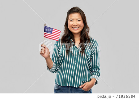 happy asian woman with flag of america happy asian woman with flag of america 71926584