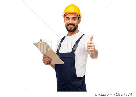 worker or builder with clipboard showing thumbs up worker or builder with clipboard showing thumbs up 71927574