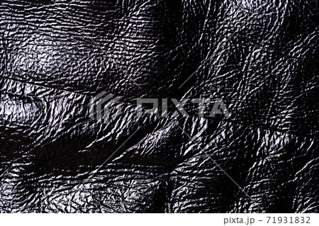 Close-up of a black leather texture background. Close-up of a black leather texture background. 71931832