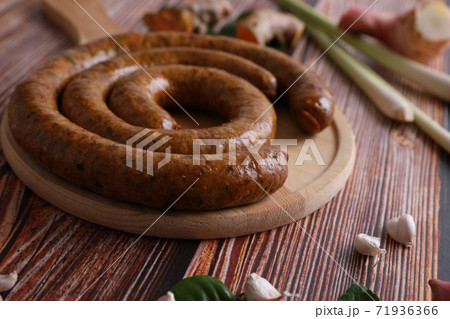 Local Northern Thai food , Northern Thai spicy sausage street food isolated in white background Local Northern Thai food , Northern Thai spicy sausage street food isolated in white background 71936366