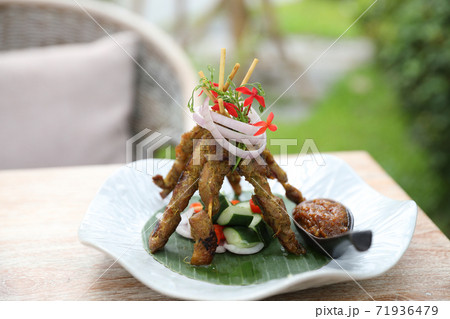 Chicken Satay on dark brown table street food appetizer 71936479