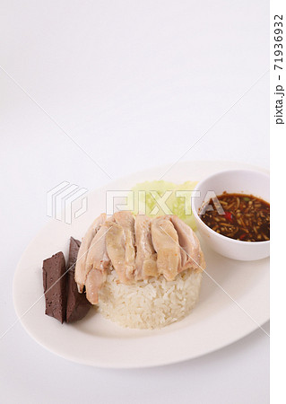 Thai food gourmet steamed chicken with rice , khao mun kai in wood background Thai food gourmet steamed chicken with rice , khao mun kai in wood background 71936932