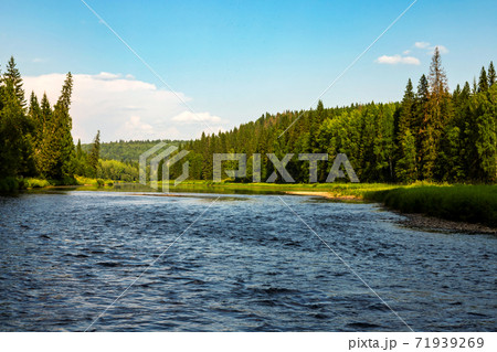Beautiful north river Usva, Ural Mountains, Perm region, Russia among forests at summer sunny day Beautiful north river Usva, Ural Mountains, Perm region, Russia among forests at summer sunny day 71939269
