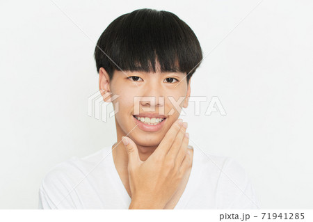 Closeup portrait of attractive young man face Closeup portrait of attractive young man face 71941285