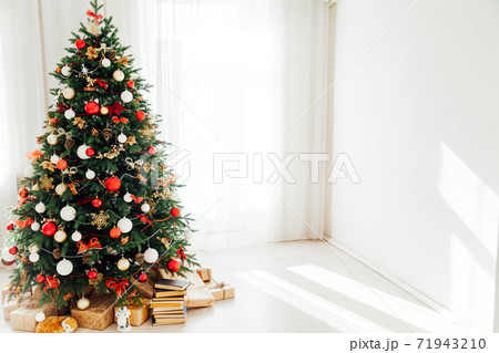Interior Christmas tree with gifts decor house new year Interior Christmas tree with gifts decor house new year 71943210