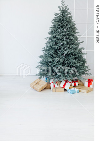 New Year's Interior Christmas Tree with home gifts 71943326