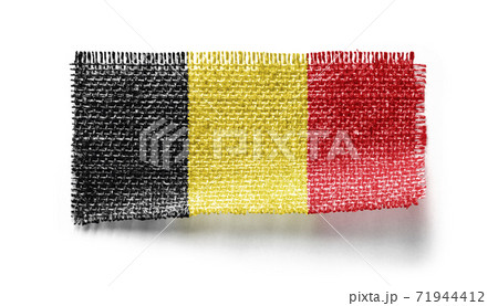 Belgium flag on a piece of cloth on a white background 71944412
