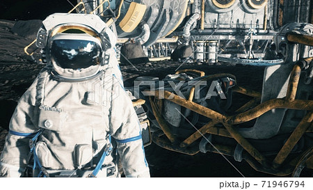An astronaut stands beside his lunar rover at the space moon base. View of the lunar surface and lunar colony. 3D Rendering. 71946794