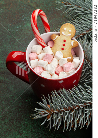 Christmas card with fir tree and cup with marshmallow 71947282