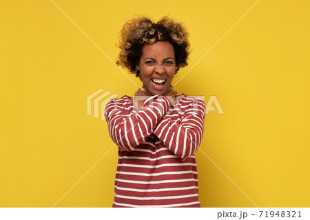 Young black woman shouting and suffocate because painful strangle Young black woman shouting and suffocate because painful strangle 71948321