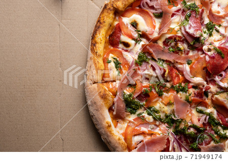 Delicious juicy pizza close-up. View from above. 71949174