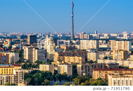 Ostankino Tower rises above Moscow cityscape, Russia Ostankino Tower rises above Moscow cityscape, Russia 71951790