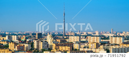 Ostankino Tower rises above Moscow cityscape in summer, Russia Ostankino Tower rises above Moscow cityscape in summer, Russia 71951792