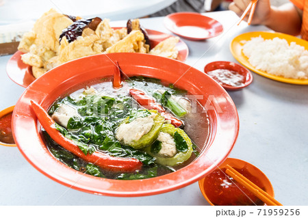 Serving of yong tau fu, Malaysia popular stuffed fish meat in vegetable and tofu. Serving of yong tau fu, Malaysia popular stuffed fish meat in vegetable and tofu. 71959256
