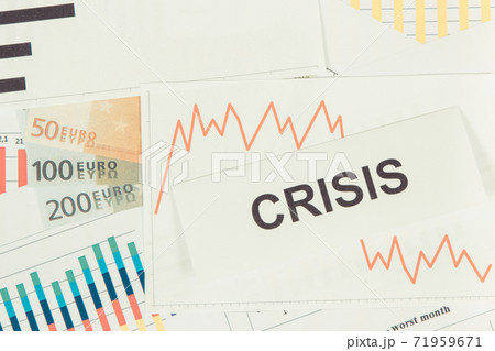 Inscription crisis, currencies euro and downward graphs representing financial crisis Inscription crisis, currencies euro and downward graphs representing financial crisis 71959671
