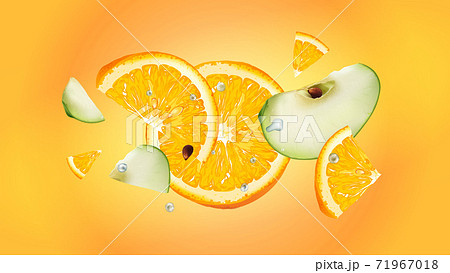 Flying slices of apple and orange on a yellow background. 71967018