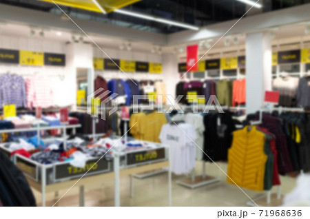 discounted clothing store with a large assortment, blurred and defocused 71968636