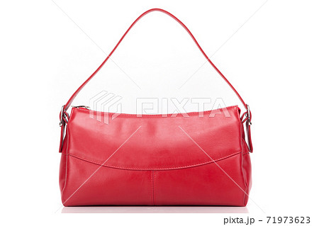 red womens designer handbag on a white background 71973623