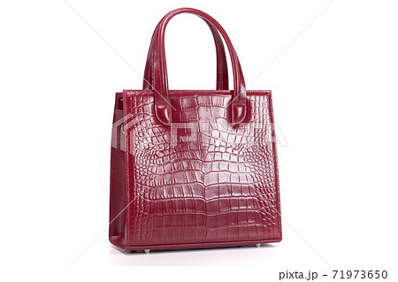 red stylish ladies leather bag on a white - Stock Photo [71973643] -  PIXTA