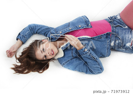 young pretty stylish brunette hipster girl posing emotional isolated on white background happy smiling cool smile, lifestyle people concept 71973912