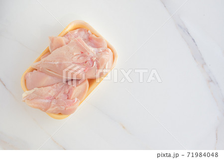 Fresh chicken meat in packaging only from the store. Chicken fillet on table with copy space 71984048