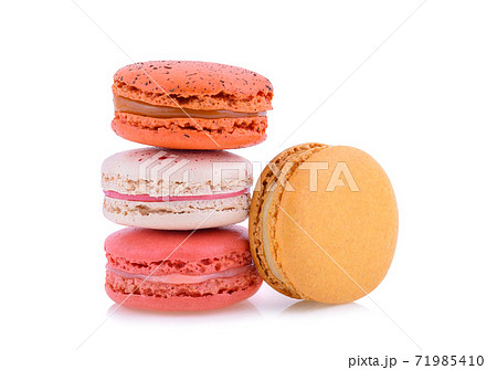 Sweet colorful macarons isolated on white background. Sweet colorful macarons isolated on white background. 71985410