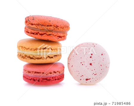 Sweet colorful macarons isolated on white background. Sweet colorful macarons isolated on white background. 71985486